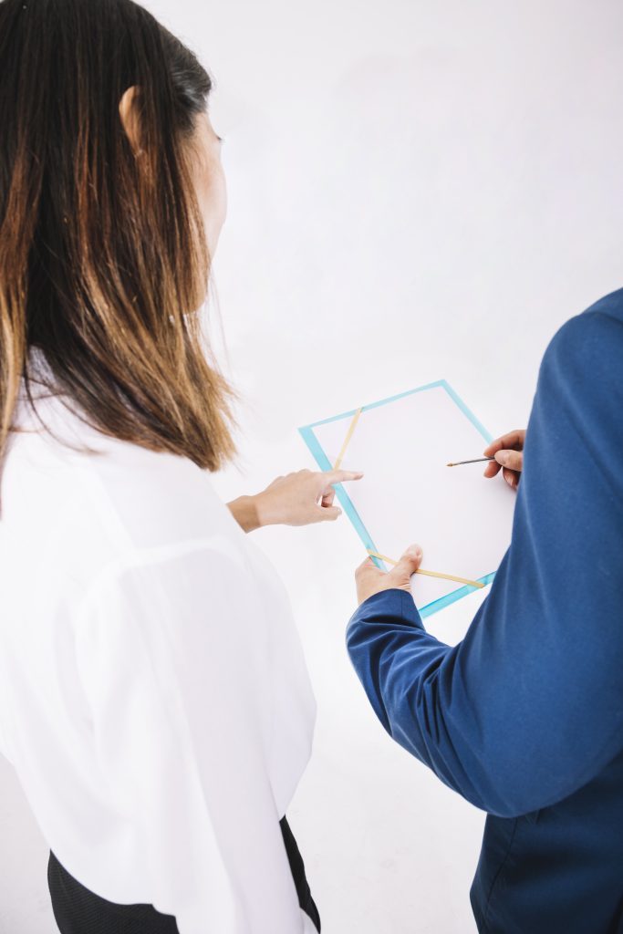 business-people-looking-clipboard